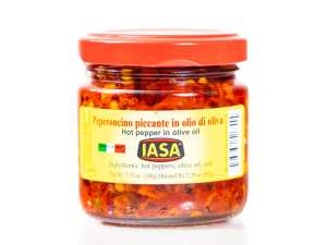 A jar of IASA Peperoncino. The jar is short and cylindrical with a red lid and a yellow label.